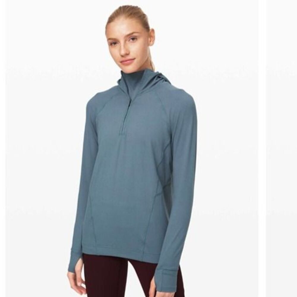 Lululemon athletica Warm Stabilizer 1/2 Zip Hoodie in Blue Charcoal. Size 10.